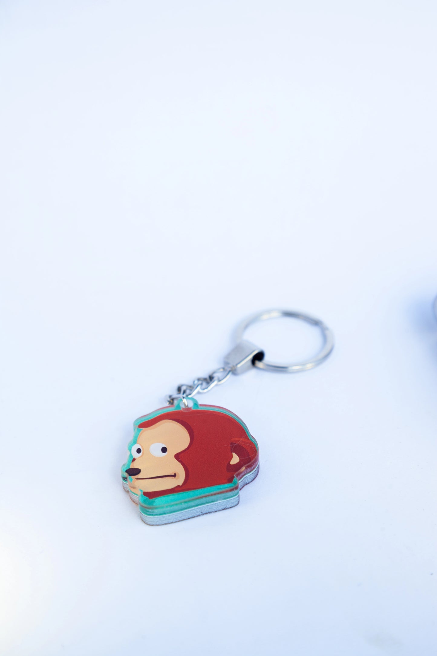 SIDE EYE MONKEY ACRYLIC KEYCHAINS